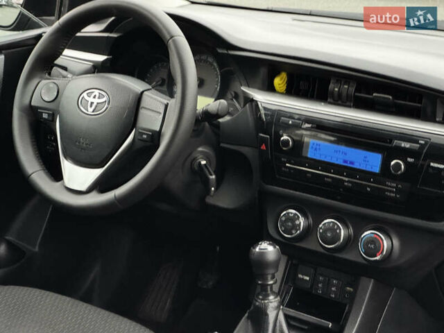 Черный Тойота Королла, объемом двигателя 1.33 л и пробегом 230 тыс. км за 7999 $, фото 8 на Automoto.ua
