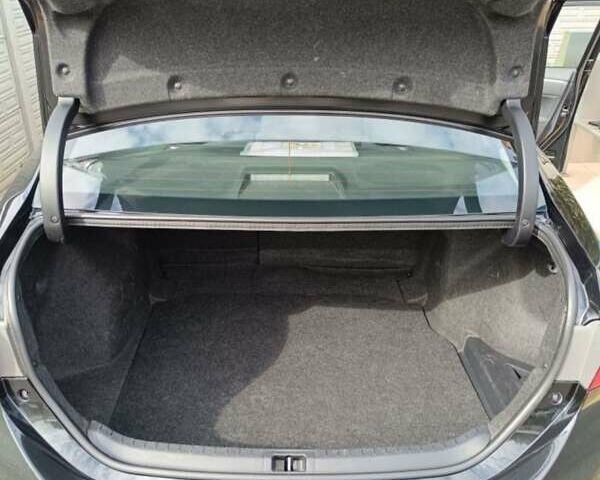 Черный Тойота Королла, объемом двигателя 1.33 л и пробегом 88 тыс. км за 12500 $, фото 6 на Automoto.ua