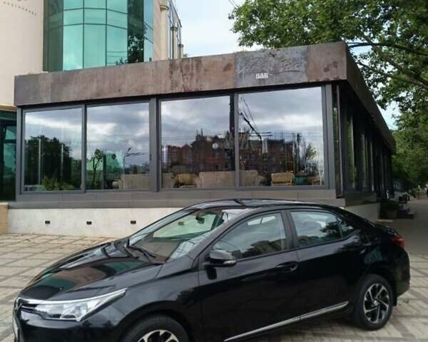 Черный Тойота Королла, объемом двигателя 1.33 л и пробегом 88 тыс. км за 12500 $, фото 1 на Automoto.ua