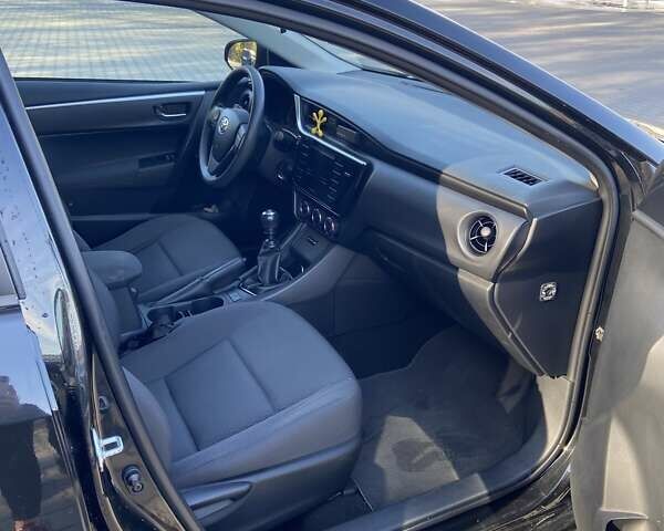 Черный Тойота Королла, объемом двигателя 1.33 л и пробегом 102 тыс. км за 12700 $, фото 5 на Automoto.ua