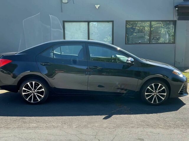 Черный Тойота Королла, объемом двигателя 1.8 л и пробегом 52 тыс. км за 11500 $, фото 7 на Automoto.ua