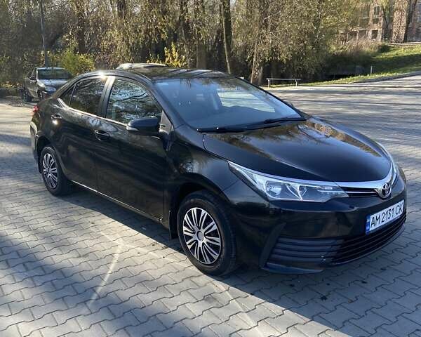 Черный Тойота Королла, объемом двигателя 1.33 л и пробегом 102 тыс. км за 12700 $, фото 2 на Automoto.ua