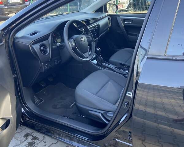 Черный Тойота Королла, объемом двигателя 1.33 л и пробегом 102 тыс. км за 12700 $, фото 4 на Automoto.ua