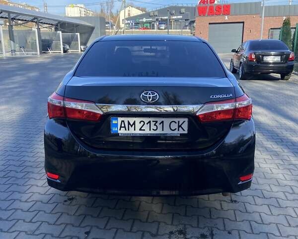 Черный Тойота Королла, объемом двигателя 1.33 л и пробегом 102 тыс. км за 12700 $, фото 1 на Automoto.ua