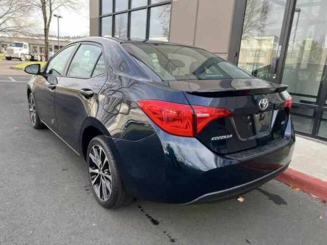 Чорний Тойота Королла, об'ємом двигуна 1.8 л та пробігом 48 тис. км за 7500 $, фото 4 на Automoto.ua