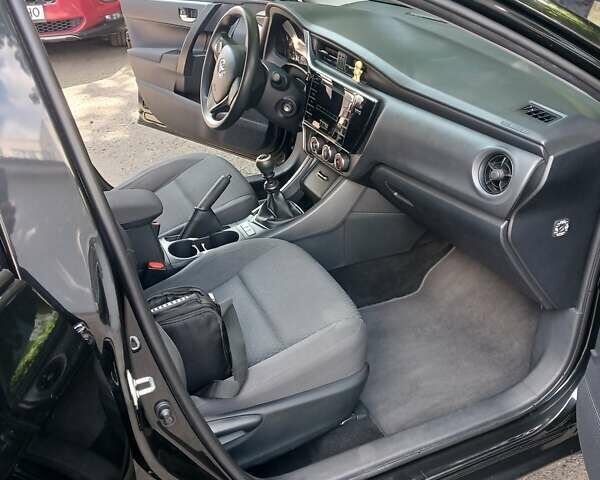 Черный Тойота Королла, объемом двигателя 1.33 л и пробегом 143 тыс. км за 11000 $, фото 3 на Automoto.ua