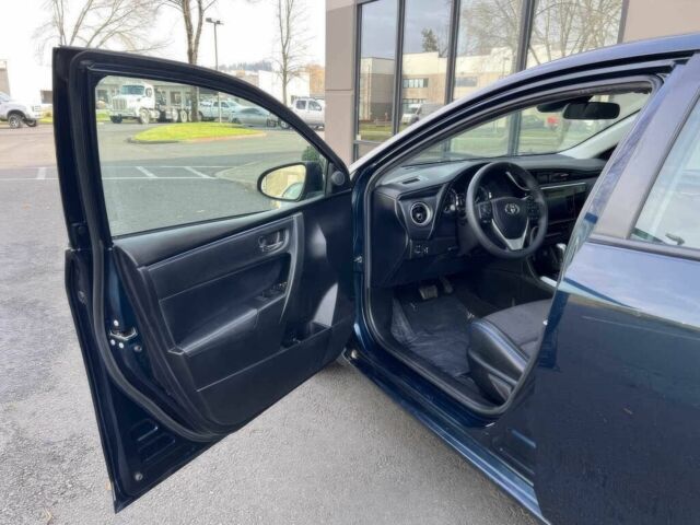 Чорний Тойота Королла, об'ємом двигуна 1.8 л та пробігом 48 тис. км за 7500 $, фото 9 на Automoto.ua