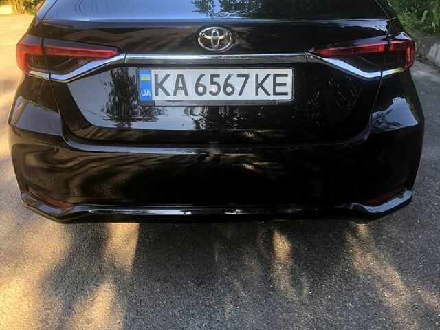 Черный Тойота Королла, объемом двигателя 1.6 л и пробегом 160 тыс. км за 13500 $, фото 2 на Automoto.ua