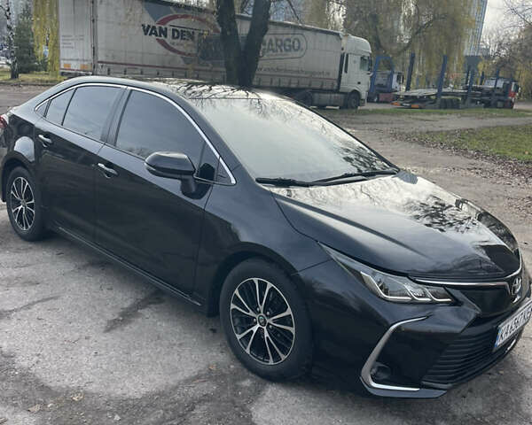 Черный Тойота Королла, объемом двигателя 1.6 л и пробегом 161 тыс. км за 14400 $, фото 1 на Automoto.ua