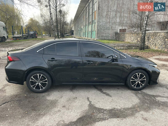 Черный Тойота Королла, объемом двигателя 1.6 л и пробегом 161 тыс. км за 14400 $, фото 3 на Automoto.ua