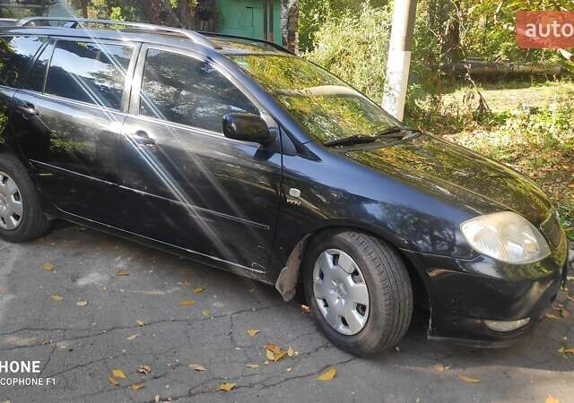 Чорний Тойота Королла, об'ємом двигуна 1.4 л та пробігом 234 тис. км за 5600 $, фото 5 на Automoto.ua