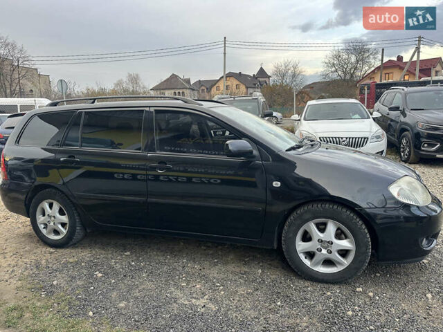 Чорний Тойота Королла, об'ємом двигуна 2 л та пробігом 330 тис. км за 5900 $, фото 3 на Automoto.ua