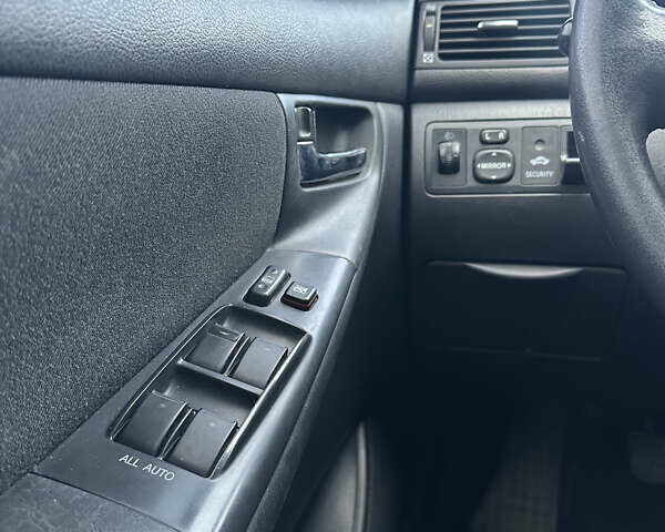 Чорний Тойота Королла, об'ємом двигуна 2 л та пробігом 330 тис. км за 5900 $, фото 15 на Automoto.ua