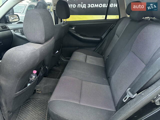 Чорний Тойота Королла, об'ємом двигуна 2 л та пробігом 330 тис. км за 5900 $, фото 9 на Automoto.ua