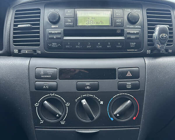 Чорний Тойота Королла, об'ємом двигуна 2 л та пробігом 330 тис. км за 5900 $, фото 12 на Automoto.ua