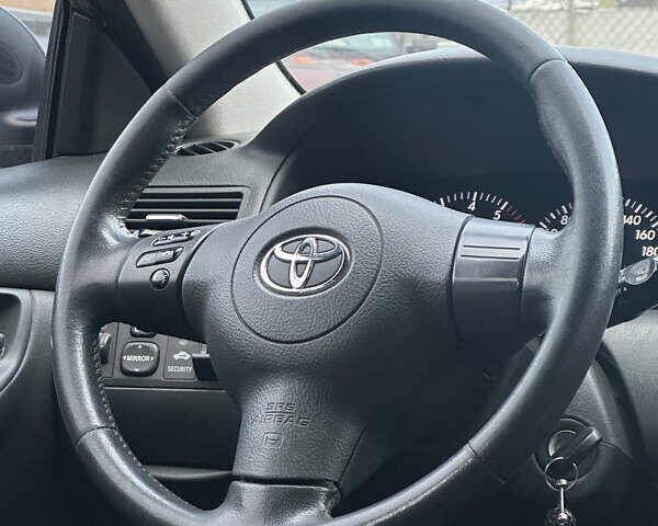 Чорний Тойота Королла, об'ємом двигуна 2 л та пробігом 330 тис. км за 5900 $, фото 14 на Automoto.ua