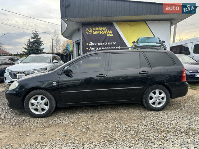 Чорний Тойота Королла, об'ємом двигуна 2 л та пробігом 330 тис. км за 5900 $, фото 7 на Automoto.ua