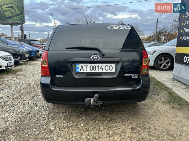 Чорний Тойота Королла, об'ємом двигуна 2 л та пробігом 330 тис. км за 5900 $, фото 5 на Automoto.ua