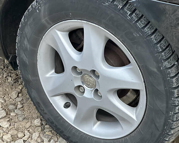 Чорний Тойота Королла, об'ємом двигуна 2 л та пробігом 330 тис. км за 5900 $, фото 16 на Automoto.ua