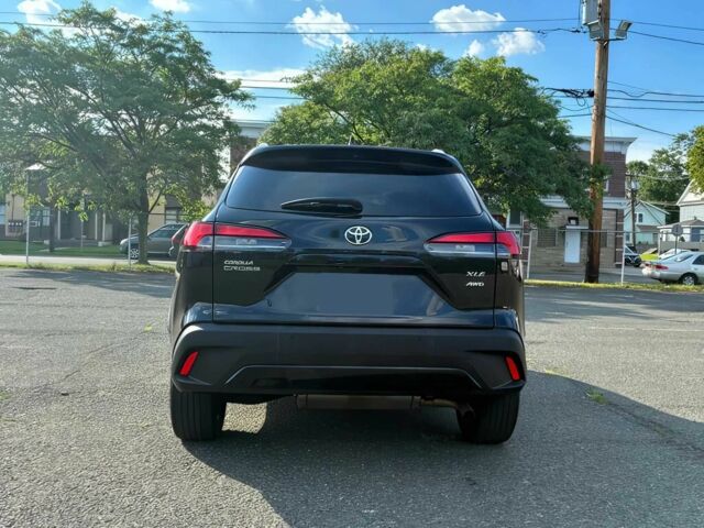 Черный Тойота Королла, объемом двигателя 2 л и пробегом 13 тыс. км за 12600 $, фото 5 на Automoto.ua