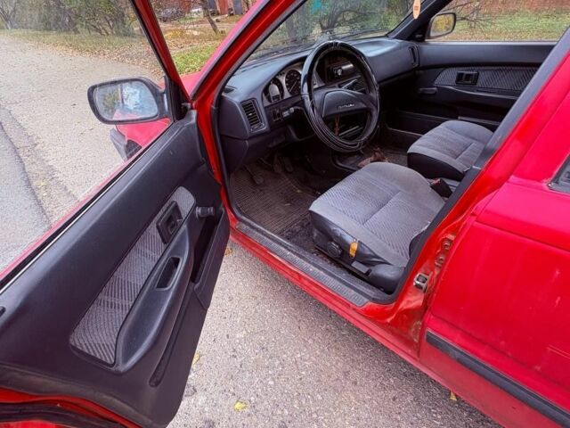 Красный Тойота Королла, объемом двигателя 1.3 л и пробегом 167 тыс. км за 900 $, фото 7 на Automoto.ua