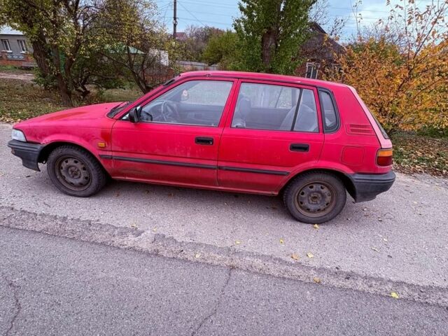 Красный Тойота Королла, объемом двигателя 1.3 л и пробегом 167 тыс. км за 900 $, фото 5 на Automoto.ua