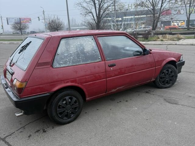 Красный Тойота Королла, объемом двигателя 1.3 л и пробегом 250 тыс. км за 800 $, фото 1 на Automoto.ua