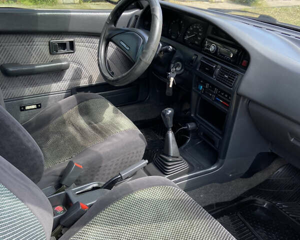 Червоний Тойота Королла, об'ємом двигуна 1.3 л та пробігом 329 тис. км за 2250 $, фото 3 на Automoto.ua