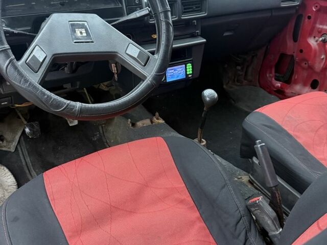 Красный Тойота Королла, объемом двигателя 1.3 л и пробегом 250 тыс. км за 800 $, фото 9 на Automoto.ua