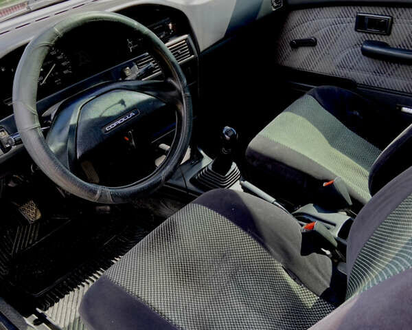 Червоний Тойота Королла, об'ємом двигуна 1.3 л та пробігом 329 тис. км за 2250 $, фото 5 на Automoto.ua