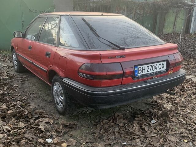 Червоний Тойота Королла, об'ємом двигуна 1.3 л та пробігом 300 тис. км за 1000 $, фото 3 на Automoto.ua