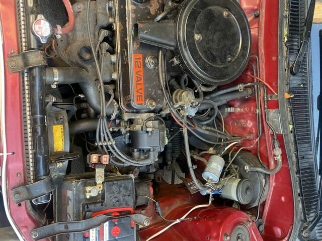 Красный Тойота Королла, объемом двигателя 1.3 л и пробегом 342 тыс. км за 1500 $, фото 7 на Automoto.ua