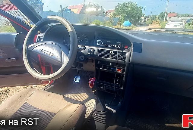 Красный Тойота Королла, объемом двигателя 1.3 л и пробегом 357 тыс. км за 750 $, фото 5 на Automoto.ua