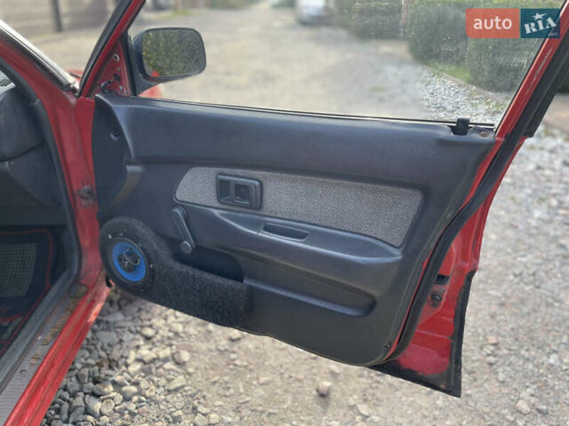 Червоний Тойота Королла, об'ємом двигуна 1.3 л та пробігом 100 тис. км за 1100 $, фото 10 на Automoto.ua