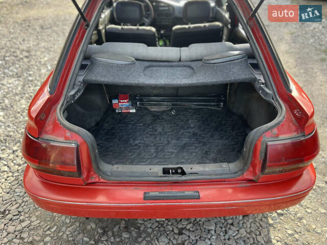 Червоний Тойота Королла, об'ємом двигуна 1.3 л та пробігом 100 тис. км за 1100 $, фото 15 на Automoto.ua