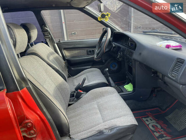 Червоний Тойота Королла, об'ємом двигуна 1.3 л та пробігом 100 тис. км за 1100 $, фото 11 на Automoto.ua