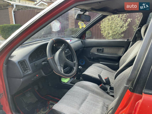 Червоний Тойота Королла, об'ємом двигуна 1.3 л та пробігом 100 тис. км за 1100 $, фото 6 на Automoto.ua