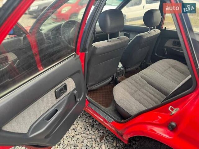 Красный Тойота Королла, объемом двигателя 1.3 л и пробегом 270 тыс. км за 1500 $, фото 16 на Automoto.ua