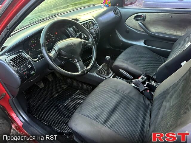 Червоний Тойота Королла, об'ємом двигуна 1.2 л та пробігом 0 тис. км за 1350 $, фото 3 на Automoto.ua