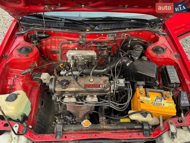 Красный Тойота Королла, объемом двигателя 1.3 л и пробегом 270 тыс. км за 1500 $, фото 21 на Automoto.ua