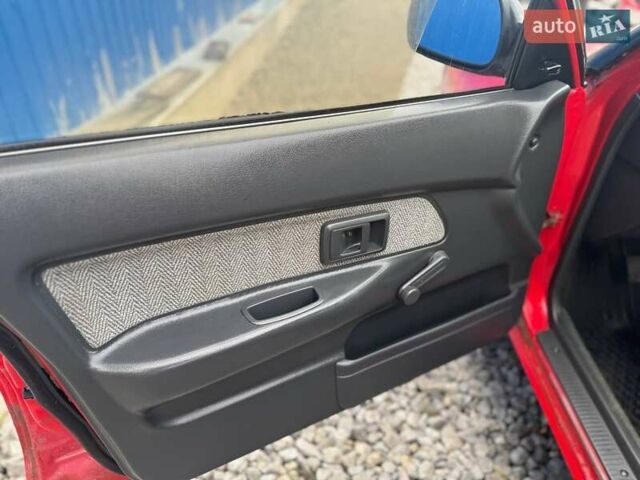 Красный Тойота Королла, объемом двигателя 1.3 л и пробегом 270 тыс. км за 1500 $, фото 12 на Automoto.ua