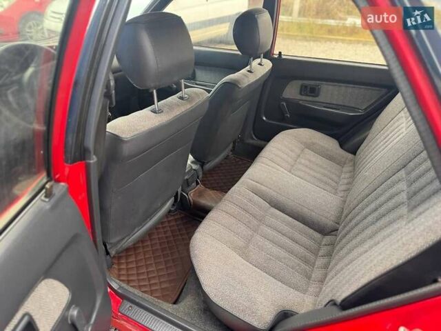 Красный Тойота Королла, объемом двигателя 1.3 л и пробегом 270 тыс. км за 1500 $, фото 15 на Automoto.ua