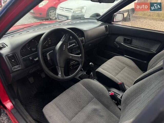 Красный Тойота Королла, объемом двигателя 1.3 л и пробегом 270 тыс. км за 1500 $, фото 13 на Automoto.ua