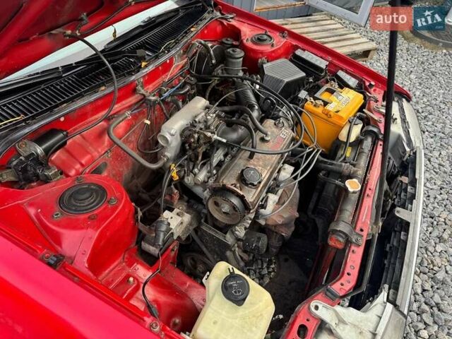 Красный Тойота Королла, объемом двигателя 1.3 л и пробегом 270 тыс. км за 1500 $, фото 24 на Automoto.ua