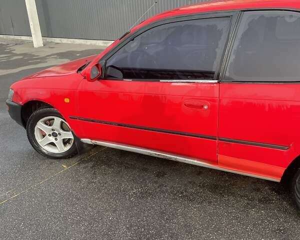 Красный Тойота Королла, объемом двигателя 1.3 л и пробегом 430 тыс. км за 1900 $, фото 4 на Automoto.ua