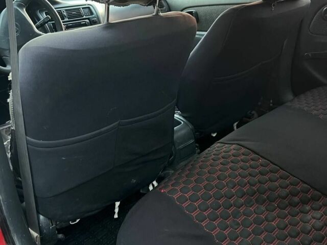 Червоний Тойота Королла, об'ємом двигуна 1.3 л та пробігом 180 тис. км за 1600 $, фото 4 на Automoto.ua