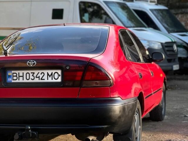 Червоний Тойота Королла, об'ємом двигуна 1.3 л та пробігом 180 тис. км за 1600 $, фото 6 на Automoto.ua