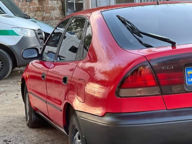 Червоний Тойота Королла, об'ємом двигуна 1.3 л та пробігом 180 тис. км за 1600 $, фото 3 на Automoto.ua