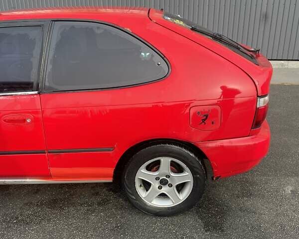 Красный Тойота Королла, объемом двигателя 1.3 л и пробегом 430 тыс. км за 1900 $, фото 5 на Automoto.ua