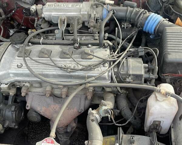 Красный Тойота Королла, объемом двигателя 1.3 л и пробегом 430 тыс. км за 1900 $, фото 7 на Automoto.ua